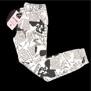 Girls newspaper style pants.